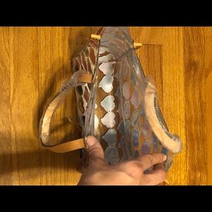 Clear tote Dooney and Burke bag.